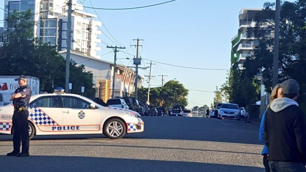 Bowen Hills streets are blocked off during an eight-hour stand-off.