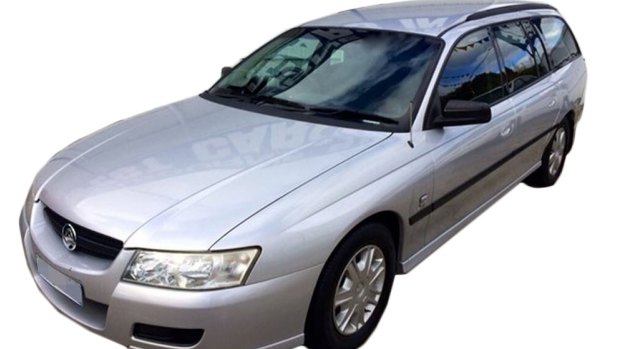 The Holden Commodore similar to the one police are looking for.