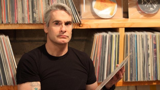 Henry Rollins rifles through his record collection for Double J.