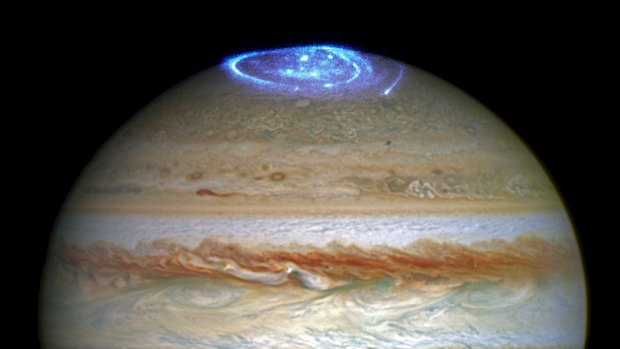 This composite of Hubble Space Telescope images shows auroras at Jupiter's north pole.