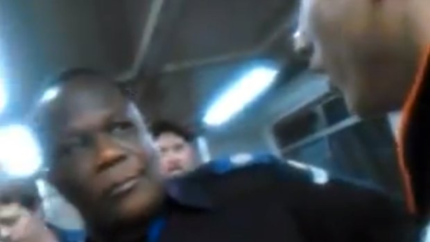 RACIST TIRADE: A screenshot from the video of a racist rant against a Queensland rail guard, pictured.