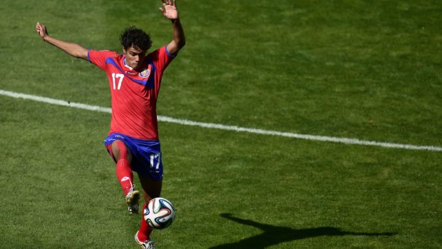 Surprise Group D winners ... Costa Rica's midfielder Yeltsin Tejeda controls the ball in the game against England.