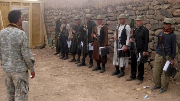 In a photo provided by the Pentagon, new members of the Afghan Local Police, in a graduation ceremony at Kalach, Afghanistan, in 2012.