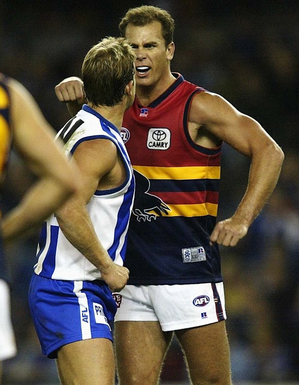 Glenn Archer and Wayne Carey come up against each other after the infamous scandal.