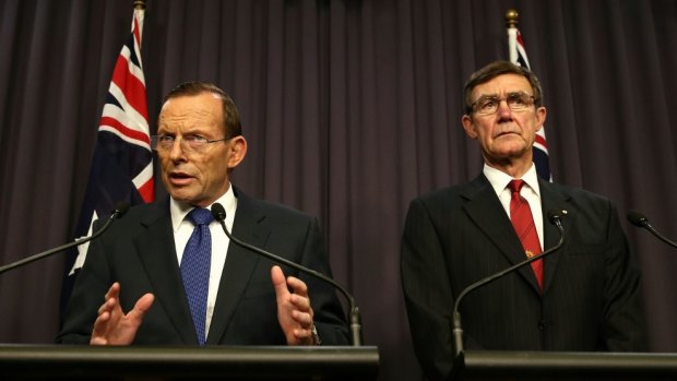Prime Minister Tony Abbott and Air Chief Marshal (retired) Angus Houston pictured in 2014.