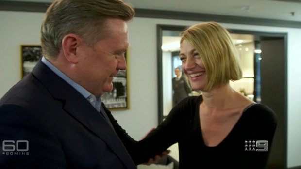 Michael Usher greets colleague Tara Brown at the beginning of a 60 Minutes interview on Lebanon.