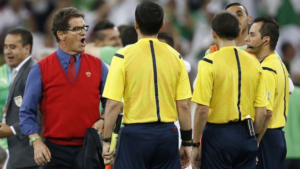 The officials may have been too distracted by Fabio Capello's attire to listen to his protests.      