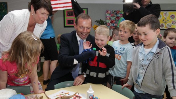 Margaret and Tony Abbott visit a Canberra childcare centre in 2012.