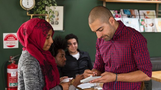 Scarf dinners help train refugees and asylum seekers.
