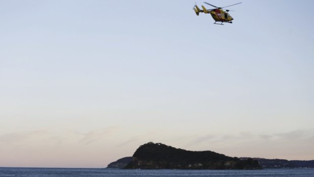 A helicopter searches for the boy missing from Pearl Beach.