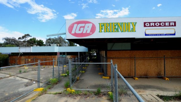 Uncertainty around the redevelopment of the derelict Giralang shops will continues four years after the redevelopment was approved by the ACT government.