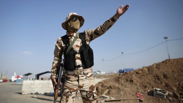 Pershmerga military at a Kurdish checkpoint on June 14, 2014. 