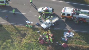 Multiple emergency services crews are at the scene of a head-on crash near Ipswich.