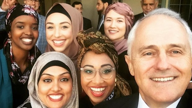 Yassmin Abdel-Magied poses for a selfie with Prime Minister Malcolm Turnbull at an Iftar dinner during the election campaign.