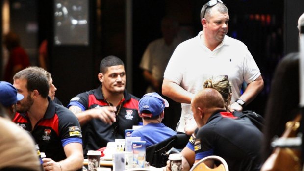 Nathan Tinkler, pictured with Knights players last year, may be forced to sell the club.