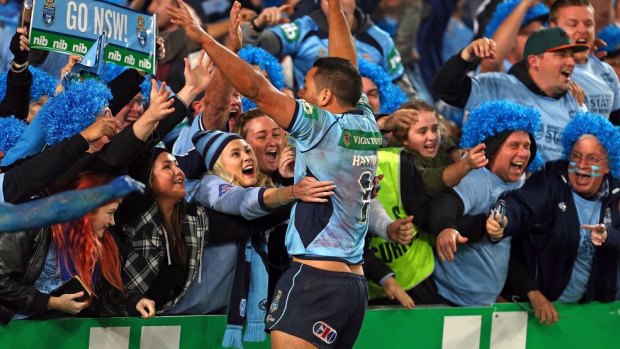 The wait is over: Jarryd Hayne celebrates with fans moments after the end of the match.
