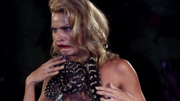  Kristy Hinze wearing  a diamond-encrusted bikini from Jodie Packer's  tigerlily  label is strangled by a diamond python during the show.