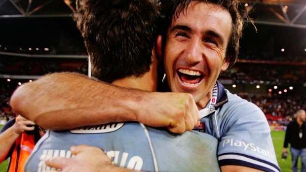 Andrew Johns embraces Anthony Minichiello after NSW won the 2005 State of Origin series.