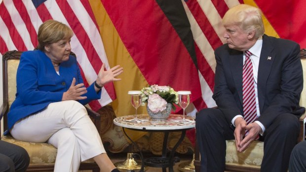 German Chancellor Angela Merkel and US President  Donald Trump meet at the G7 summit. 