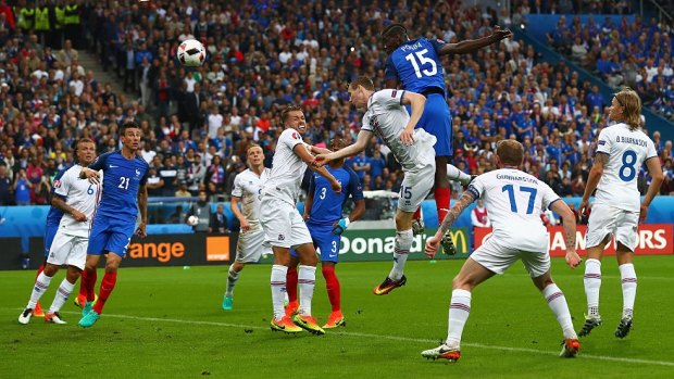 Class above: Paul Pogba scores France's second goal.