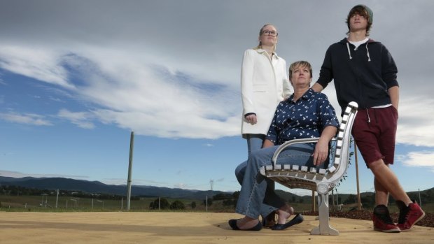 Skye, Fiona and Jay Vickery following the dedication of a memorial bench for Wayne Vickery in 2014.