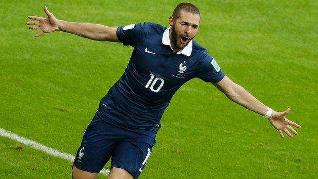 France's talisman Karim Benzema celebrates his Group E goal against Honduras.