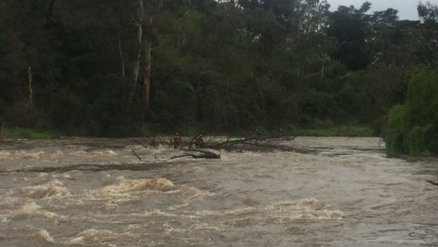 Two women stranded in the Yarra River at Warrandyte after their kayak capsized. 