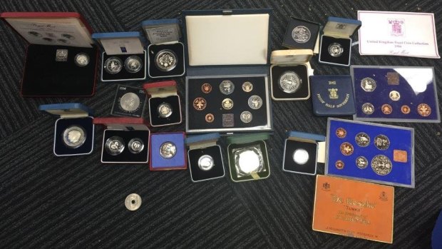 Some of the coins found during a raid on a house in Werribee.