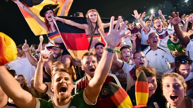 Germany fans celebrate the victory over Algeria in a fan zone in Rio deJjaneiro.