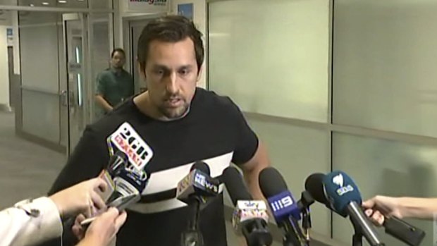 Remorseful: Mitchell Pearce on his return to Sydney Airport. 