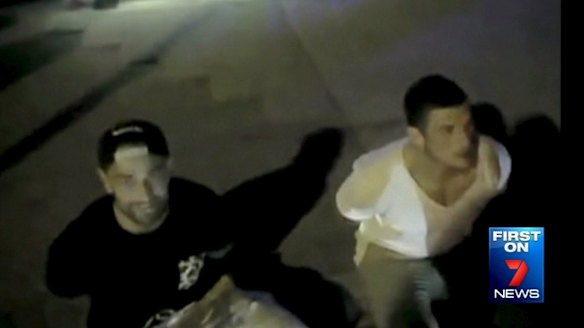 Handcuffed: Sutton and Burgess on a Flagstaff kerb.