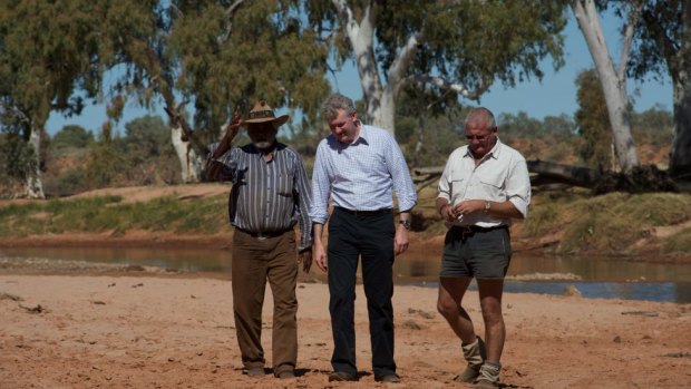 Bruce Breaden, traditional owner, the then environment minister Tony Burke and RM Williams Agricultural Holdings managing director David Pearse at Henbury in 2011.