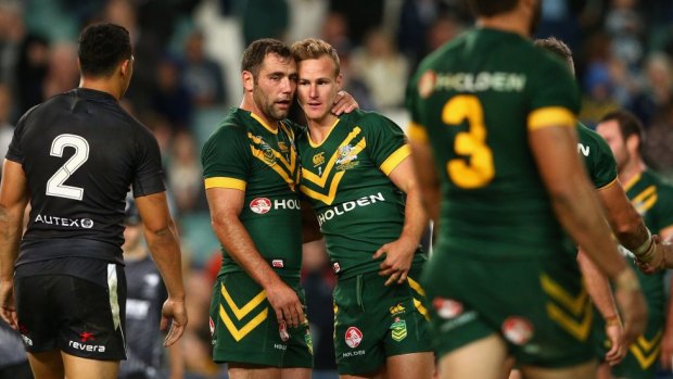 Kangaroos captain Cameron Smith embraces Daly Cherry-Evans after winning the ANZAC Test.