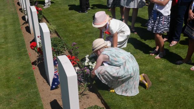 Australians lay flowers in memory of those lost at Fromelles.