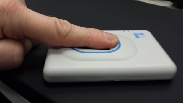 The mobile scanning device connects to police officers' phones via Bluetooth.