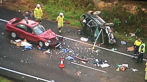A three-car crash blocks the Bruce Highway