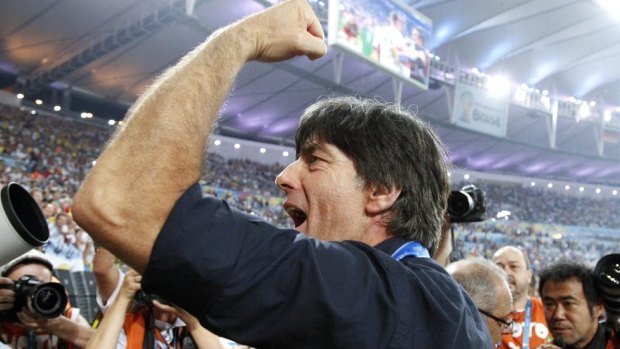 Germany's head coach Joachim Loew acknowledges the cheers of the supporters.