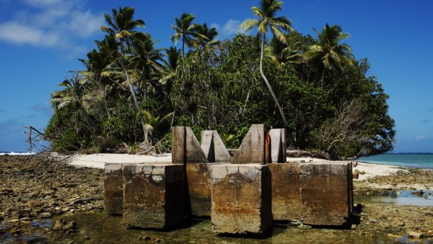 An old US anti-aircraft-gunturret on the Pacific Ocean island of Tuvalu where sea-levels are rising. 