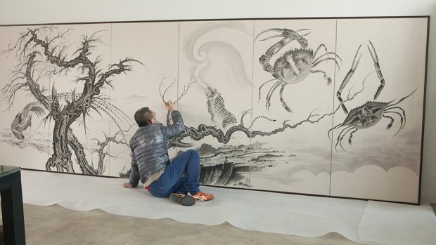 Sun Xun working on Invisible Magic (2018) at the Museum of Contemporary Art Australia.