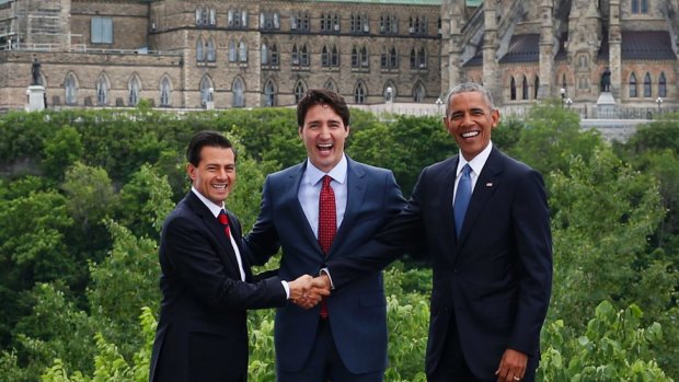 Enrique Pena Nieto, Mexico's President, with Justin Trudeau, Canada's Prime Minister, and US President Barack Obama in Ottawa last month. NAFTA has eliminated most tariffs on trade between the three countries.