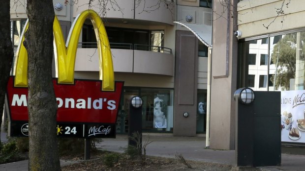 Staff at McDonald's Braddon were threatened with a knife during a robbery overnight.
