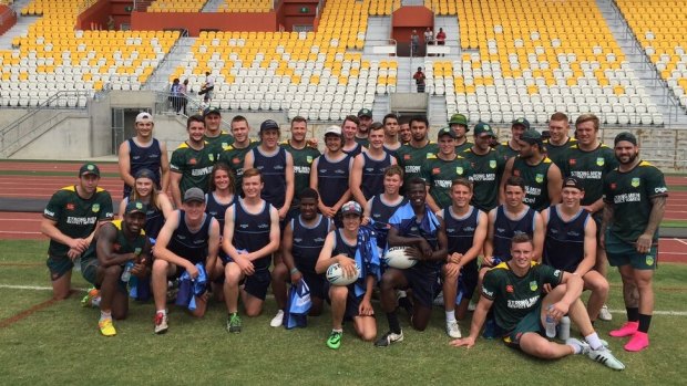Team bonding: The Prime Minister's XIII and NSW U16 Young Achievers team in Port Moresby, Papua New Guinea. 