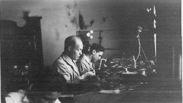 Jozef Gross (front) and Andrew Belza in Gross' jewellery workshop, believed to be at Latham House in Swanston Street, Melbourne, in the mid-'50s. 