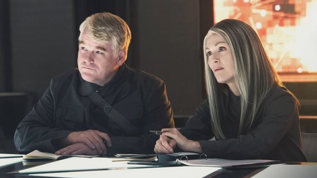 

The Hunger Games
June 3  

Philip Seymour Hoffman as Plutarch Heavensbee and Julianne Moore as President Coin in <i>The Hunger Games: Mockingjay Part I</i>.