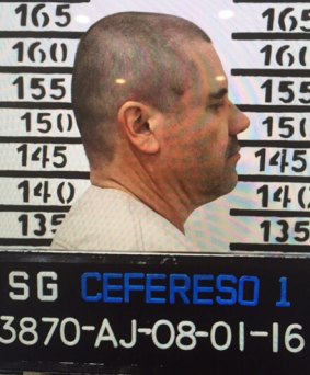 Mexico's most wanted drug lord, Joaquin "El Chapo" Guzman, stands for his prison mug shot.