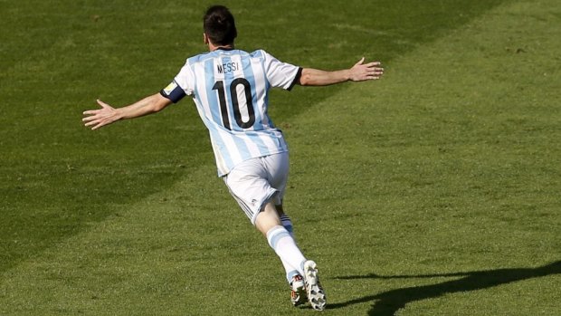 Hero: Lionel Messi was booed by Argentine fans three years ago.