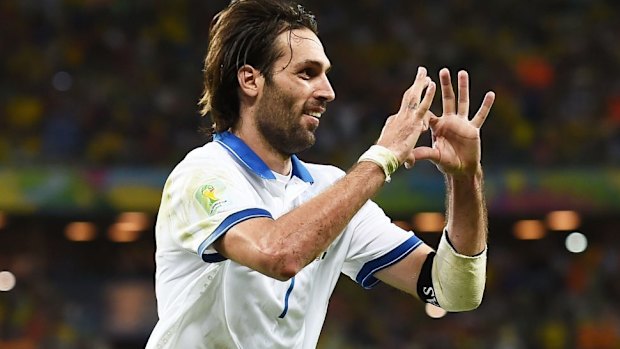 Late drama: Giorgos Samaras of Greece celebrates scoring his team's winner.