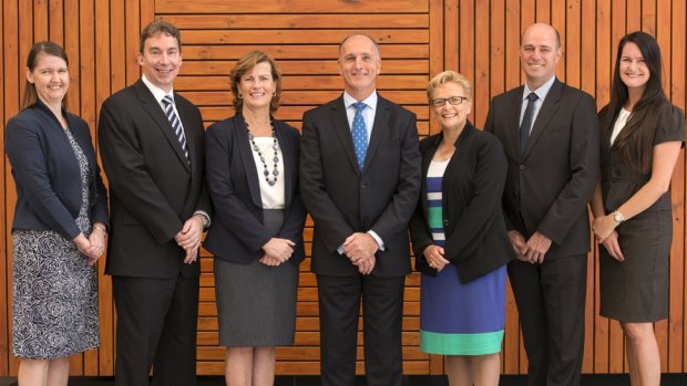 Greg Dyer, new chief executive of Parramatta City Council and former 1980s Australian wicket-keeper, centre, with the council's new executive team. Feb 2015
