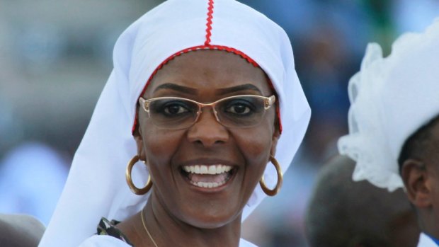 Zimbabwean first lady Grace Mugabe, centre smiles as she addresses members of different church denominations at Rufaro Stadium in Harare.