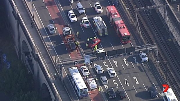 Emergency services at the scene of a car crash on the Sydney Harbour Bridge.